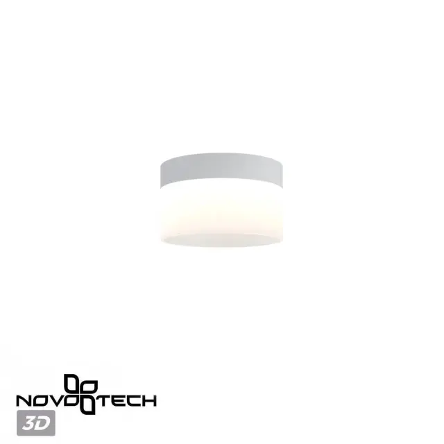 Накладной точечный светильник Novotech в минималистичном стиле, черный алюминиевый корпус и белый матовый акрил, ракурс 4