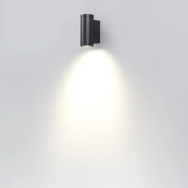 Настенный уличный светильник Odeon Light матовый черный цилиндр минималистичной формы, металл и стекло, ракурс 2